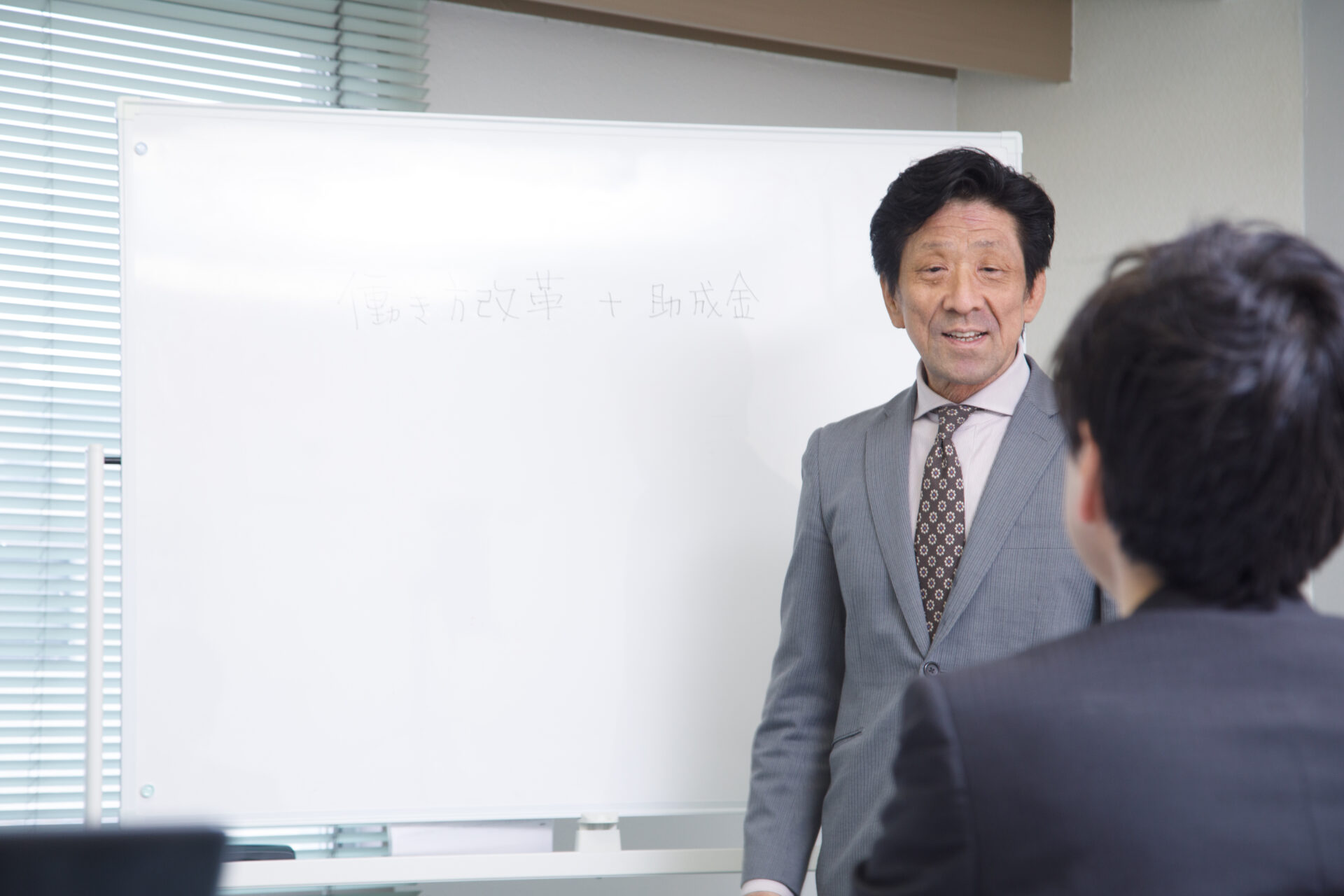 代表・千田による講義の写真